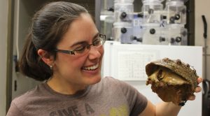 Kristin Aquilino holds white abalone